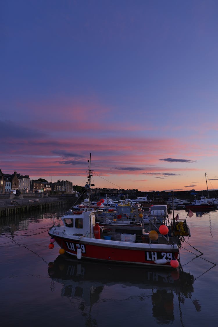 Recreational Boats Moored At Dusk