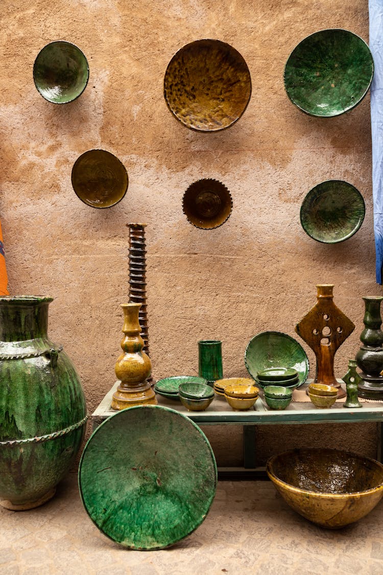 Decorative Plates And Vases On Display