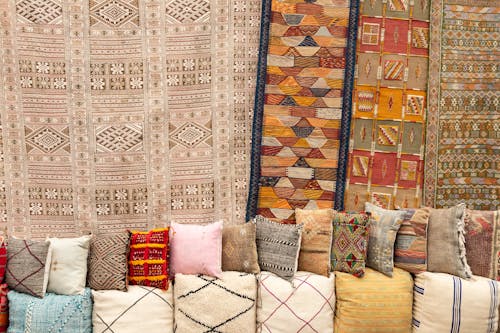 Assorted Fabrics and Throw Pillows on Display