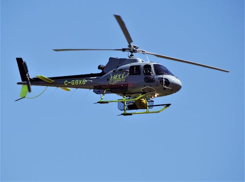 Foto profissional grátis de céu azul, hélice, helicóptero