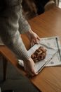 Woman Putting Food on Table