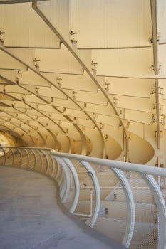 Intricate wooden structure forming a walkway at Metropol Parasol in Seville.