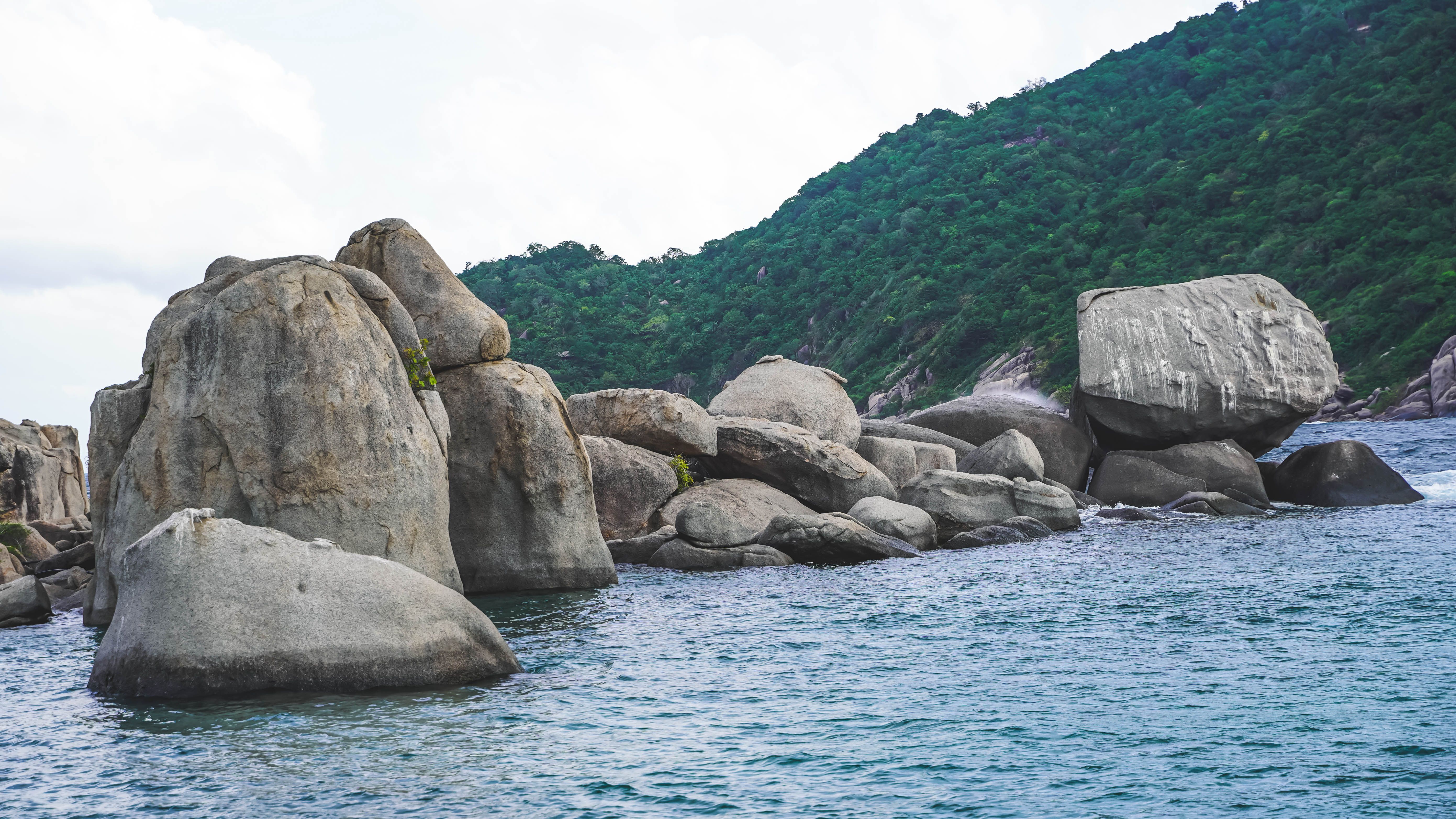 Gray Rocks on Sea Shore · Free Stock Photo