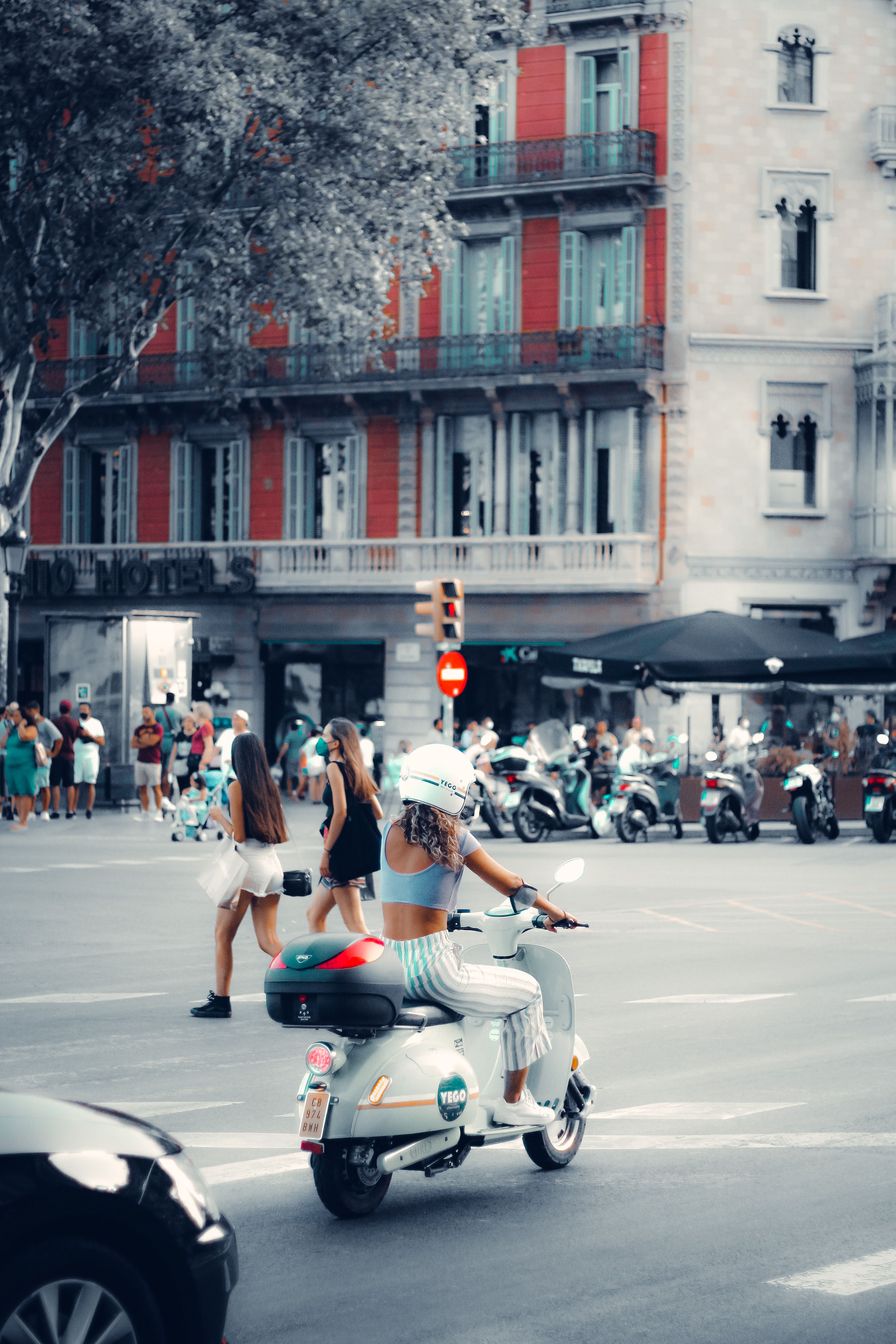 A Woman Riding a Motorcycle · Free Stock Photo