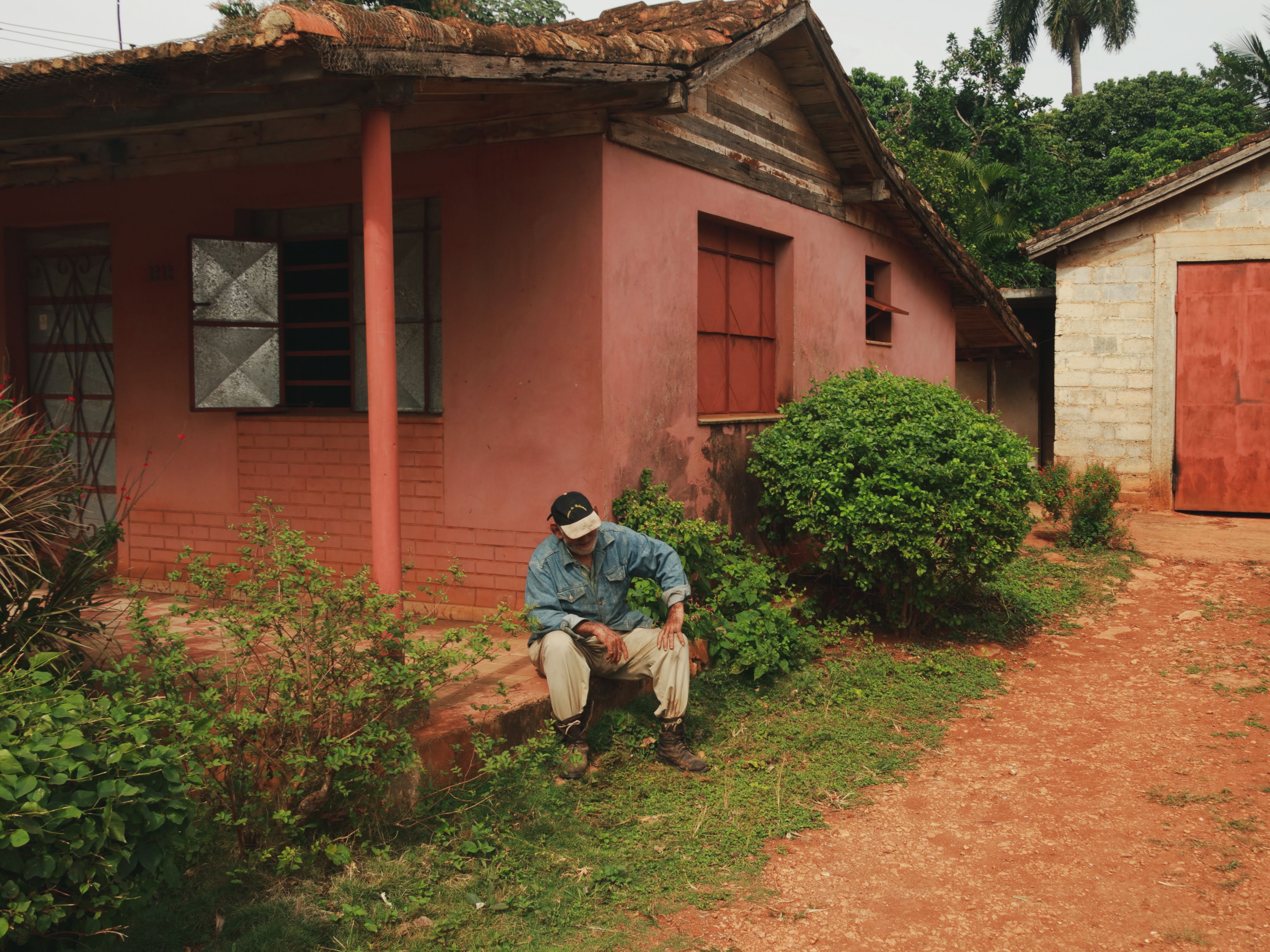 man frustrated front yard