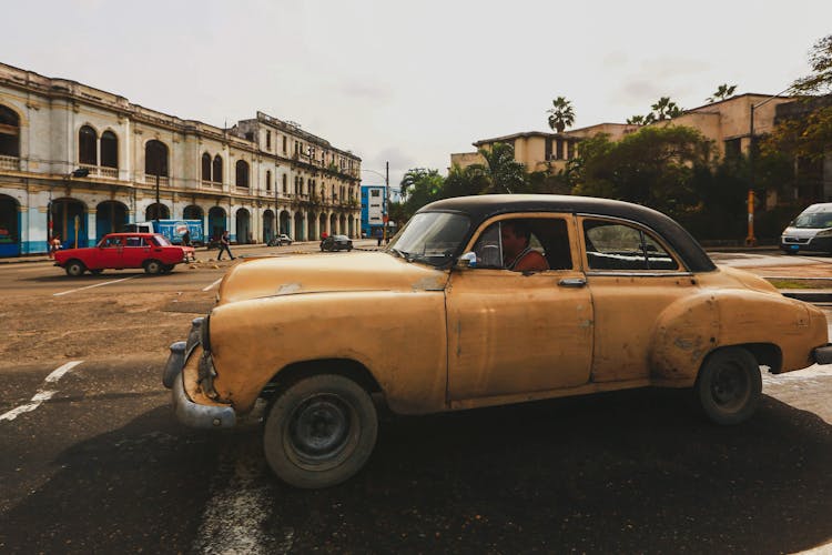 Rusty Vintage Car On Street Of Havana, Cuba