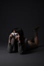 Unrecognizable Brunette Woman Lying and Taking Photo