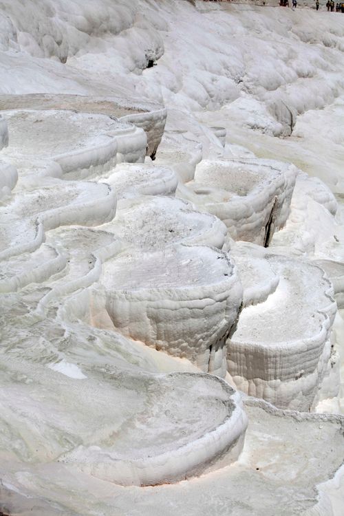Free Beautiful white travertine terraces exemplifying nature's artistry at Pamukkale, Turkey. Stock Photo