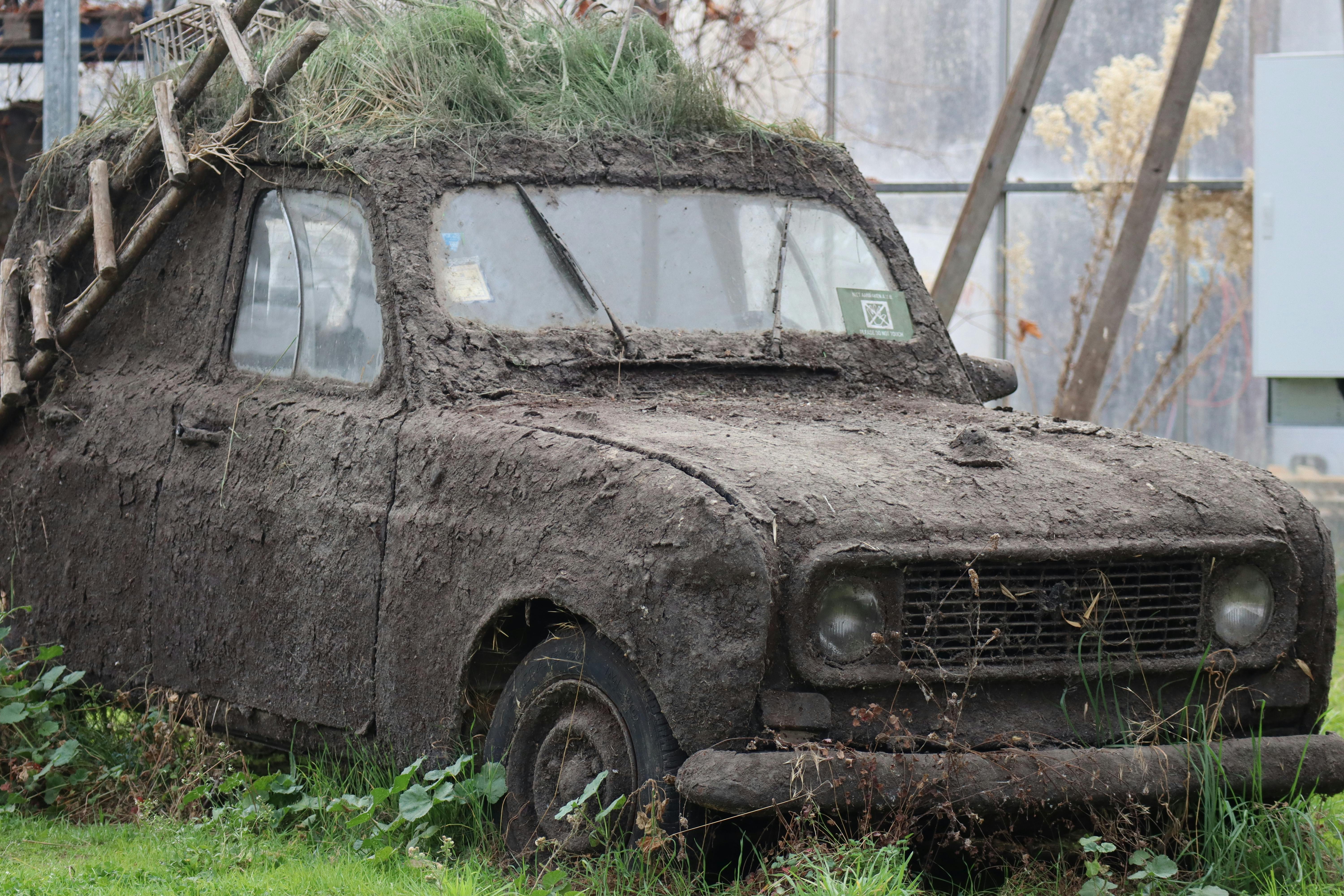 Parked Car Covered in Mud · Free Stock Photo