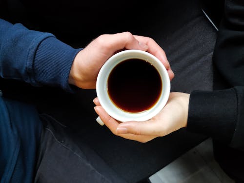 Free Person Holding White Ceramic Mug With Coffee Stock Photo