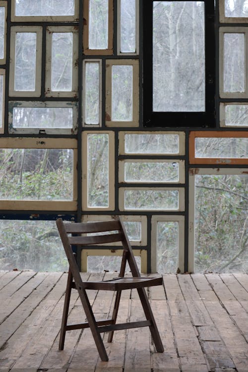 Brown Wooden Chair on Wooden Floor