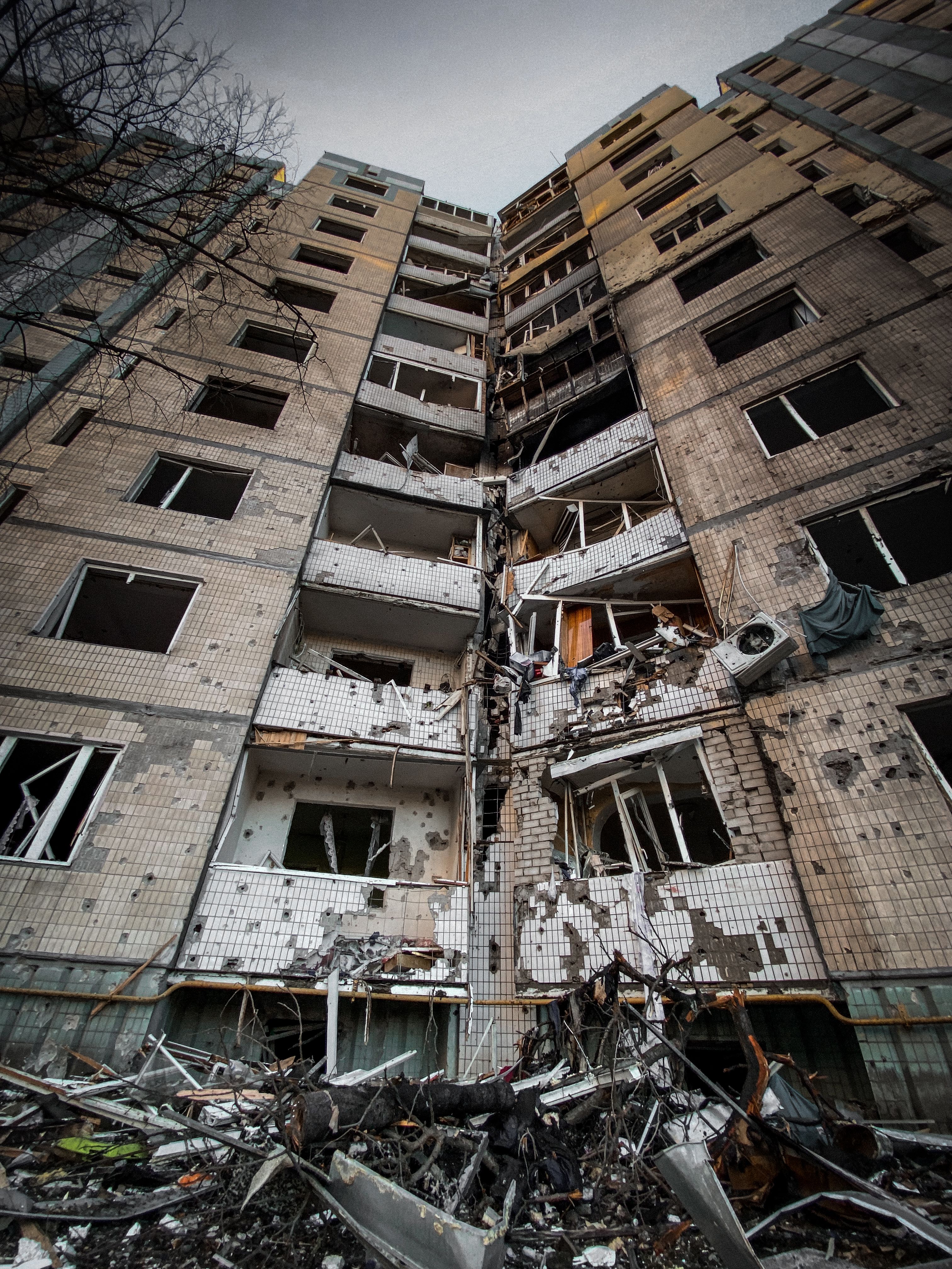 Low Angle Shot of a Broken Building · Free Stock Photo
