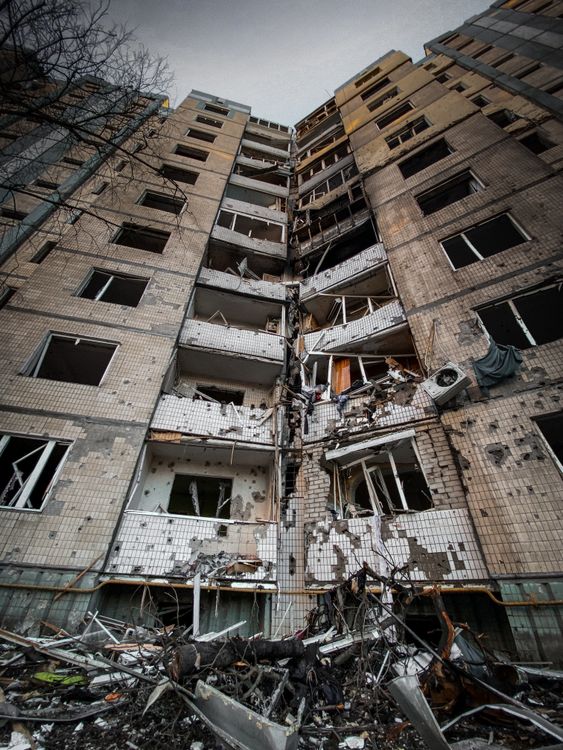 Low Angle Shot of a Broken Building · Free Stock Photo