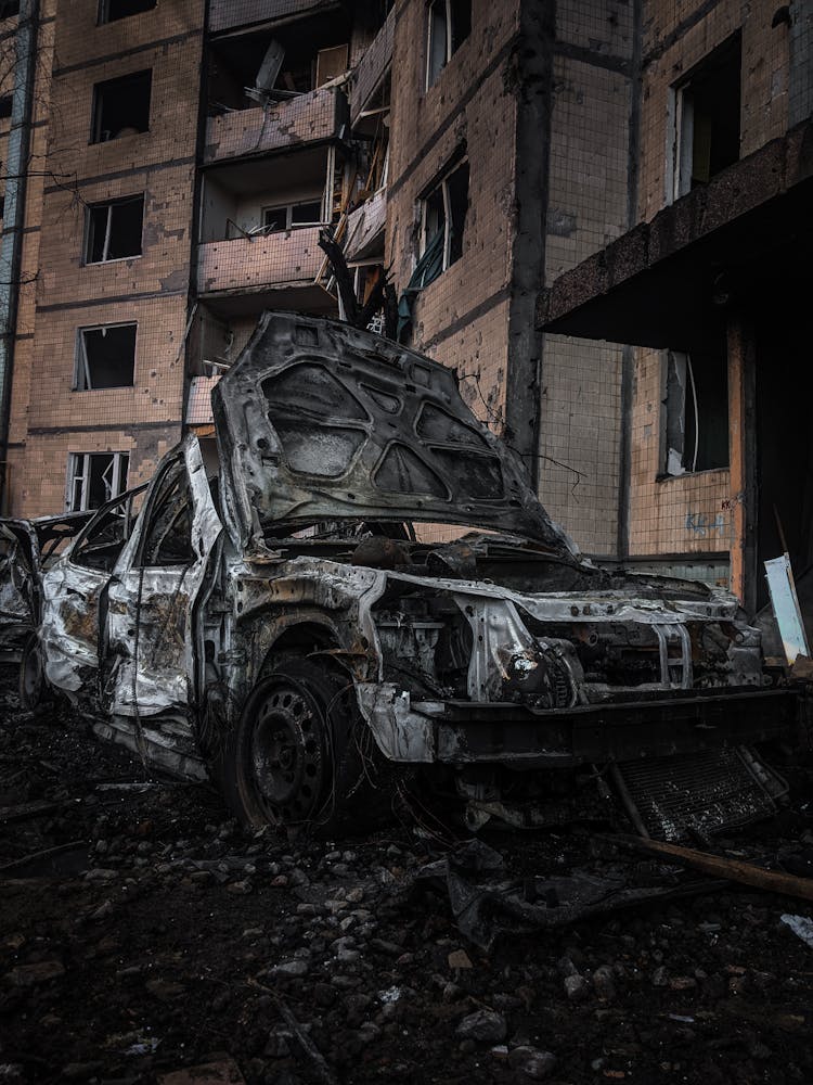 Broken Car Near The Building