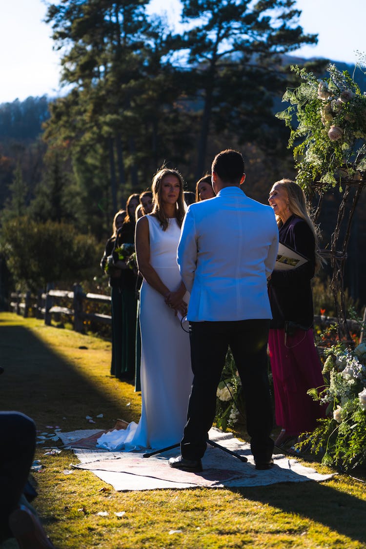 A Bride And Groom In Outdoor Wedding