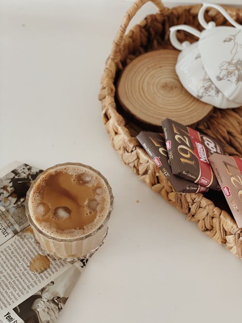 Chocolate Bars in Basket Near a Chocolate Drink