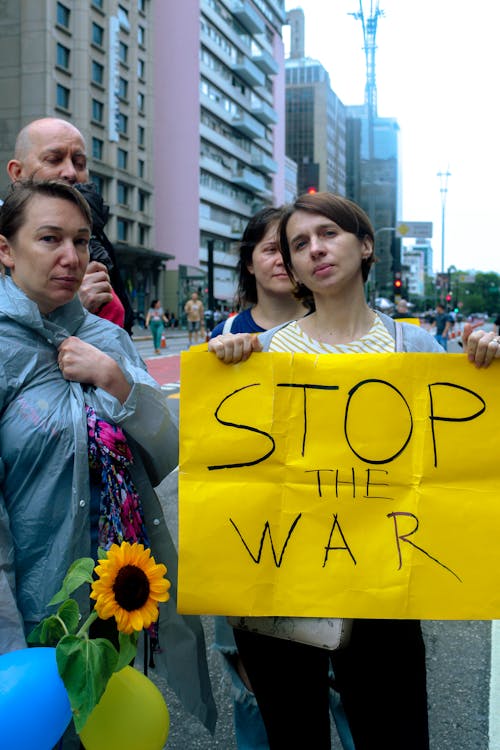 Fotos de stock gratuitas de banderola, calle, detengan la guerra