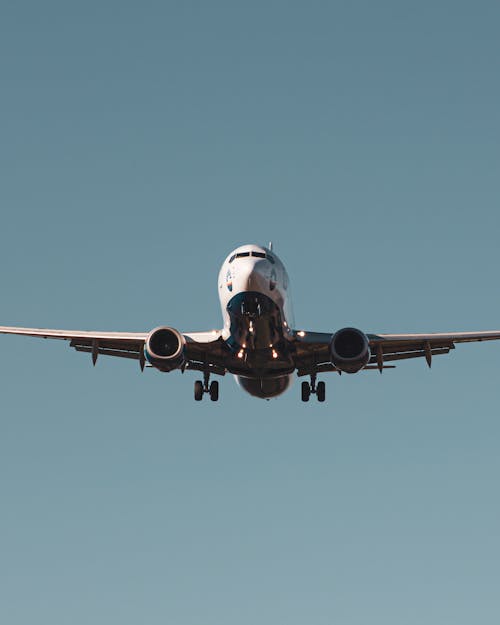 Foto d'estoc gratuïta de avió, cel blau, primer pla