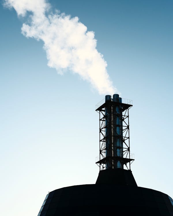 Industrial Chimney Under the Blue Sky