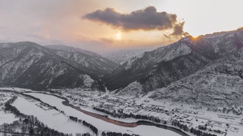 Aerial Photography of Snow-Covered Mountains during Sunset