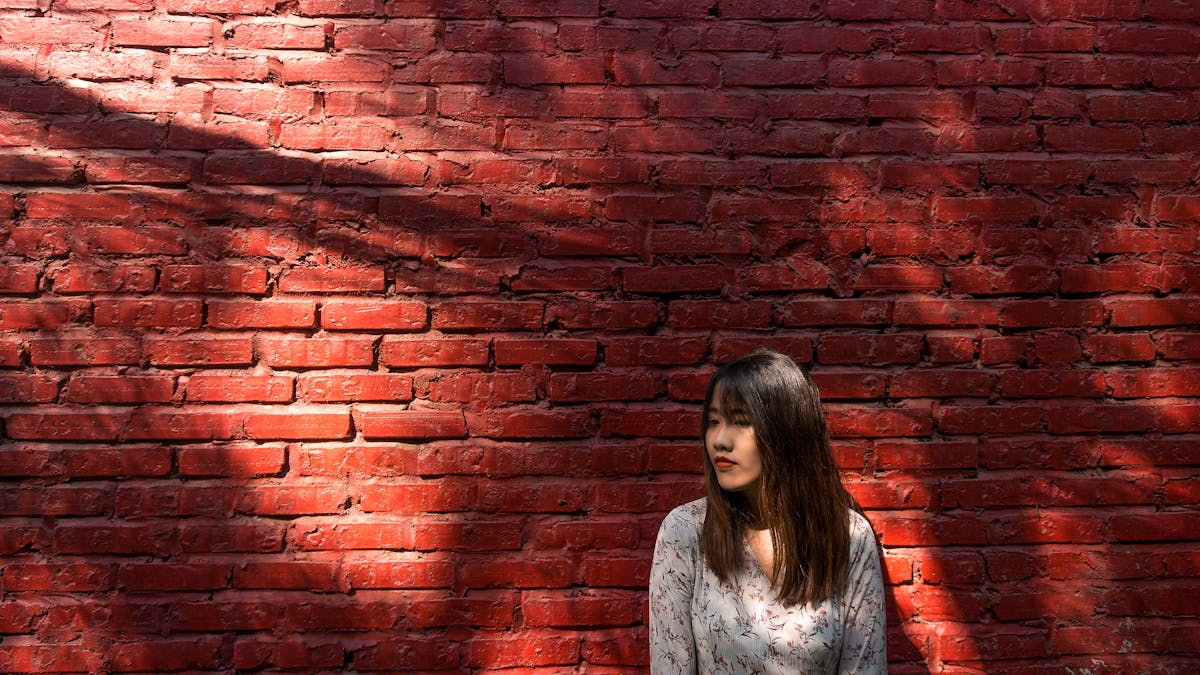 Traveler pulling luggage in an airport terminal