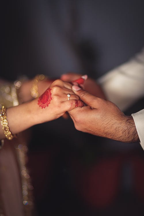 Close-up of the Hands of a Married Couple