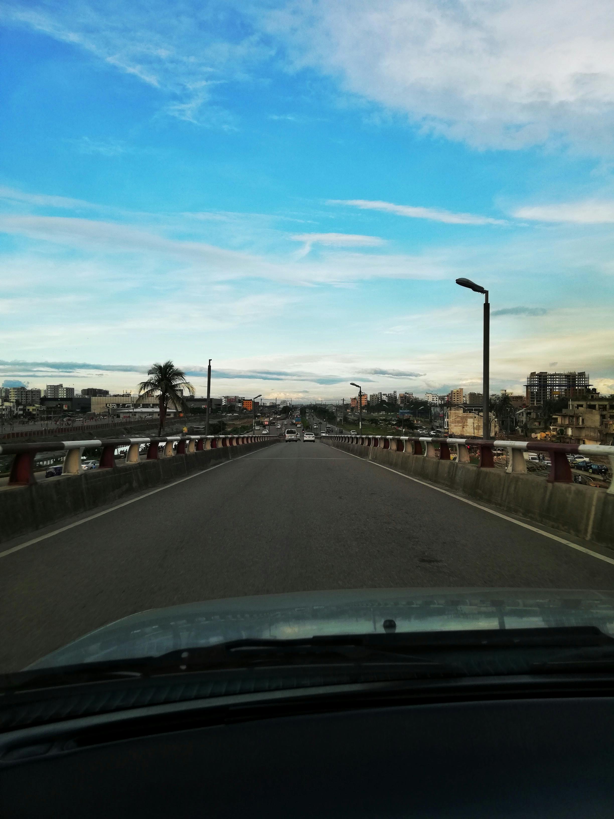 Free stock photo of blue sky, bridge view, car view