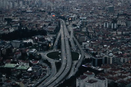 Free Explore the sprawling urban landscape of Istanbul with its intricate highway network from above. Stock Photo