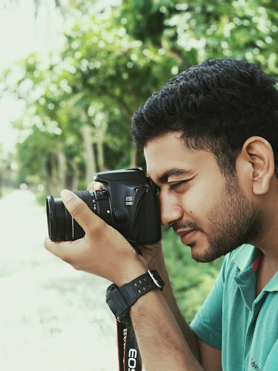 Man Using Canon Eos Camera