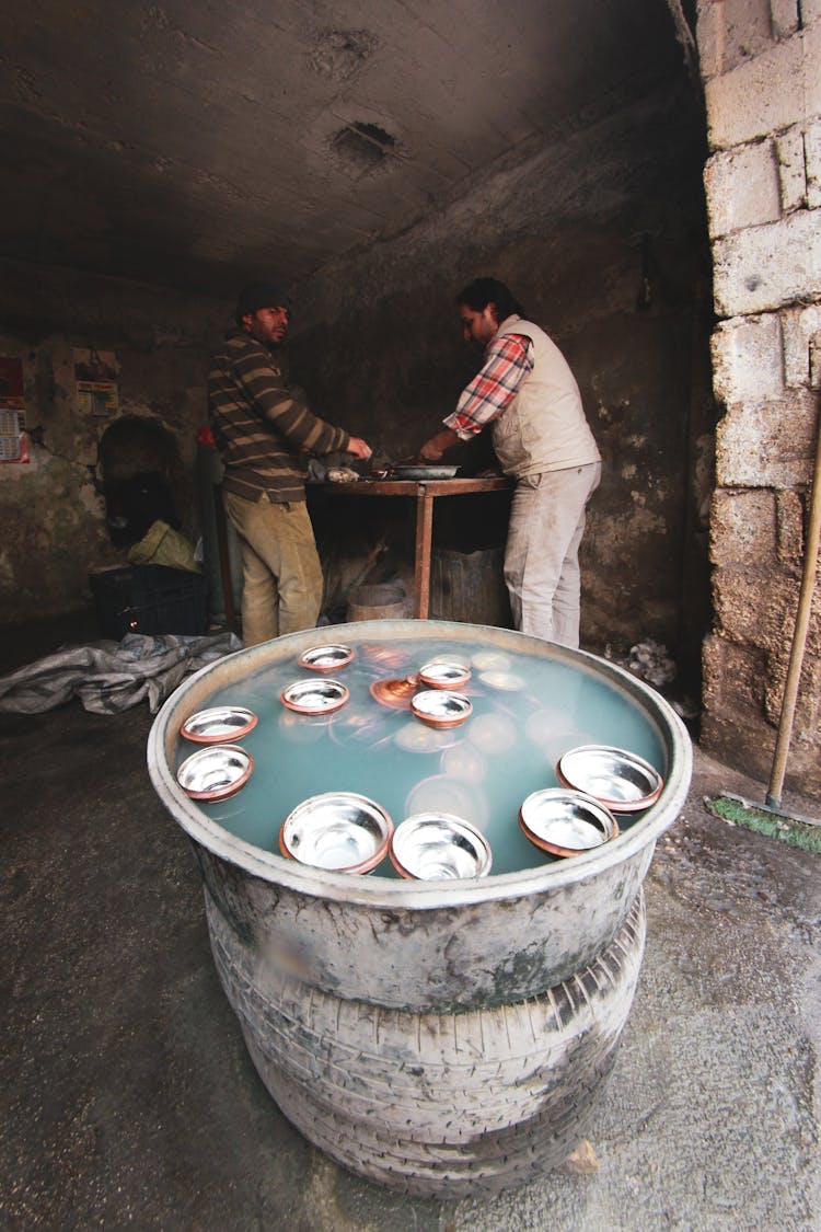 Two Men In Workshop