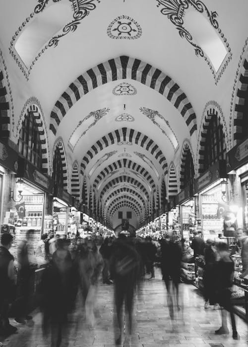 People Walking on Street in Grayscale Photography