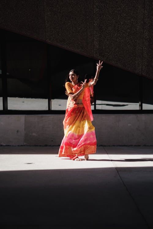 Woman in Traditional Indian Dress Dancing · Free Stock Photo