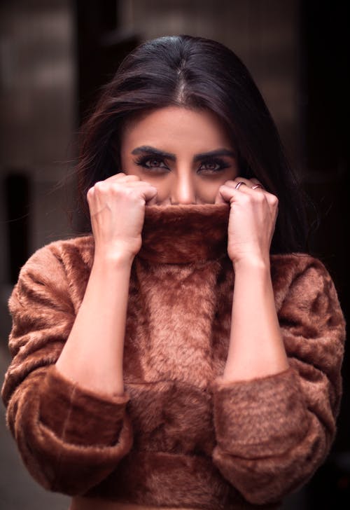 Free A Woman in Brown Fur Sweater Stock Photo