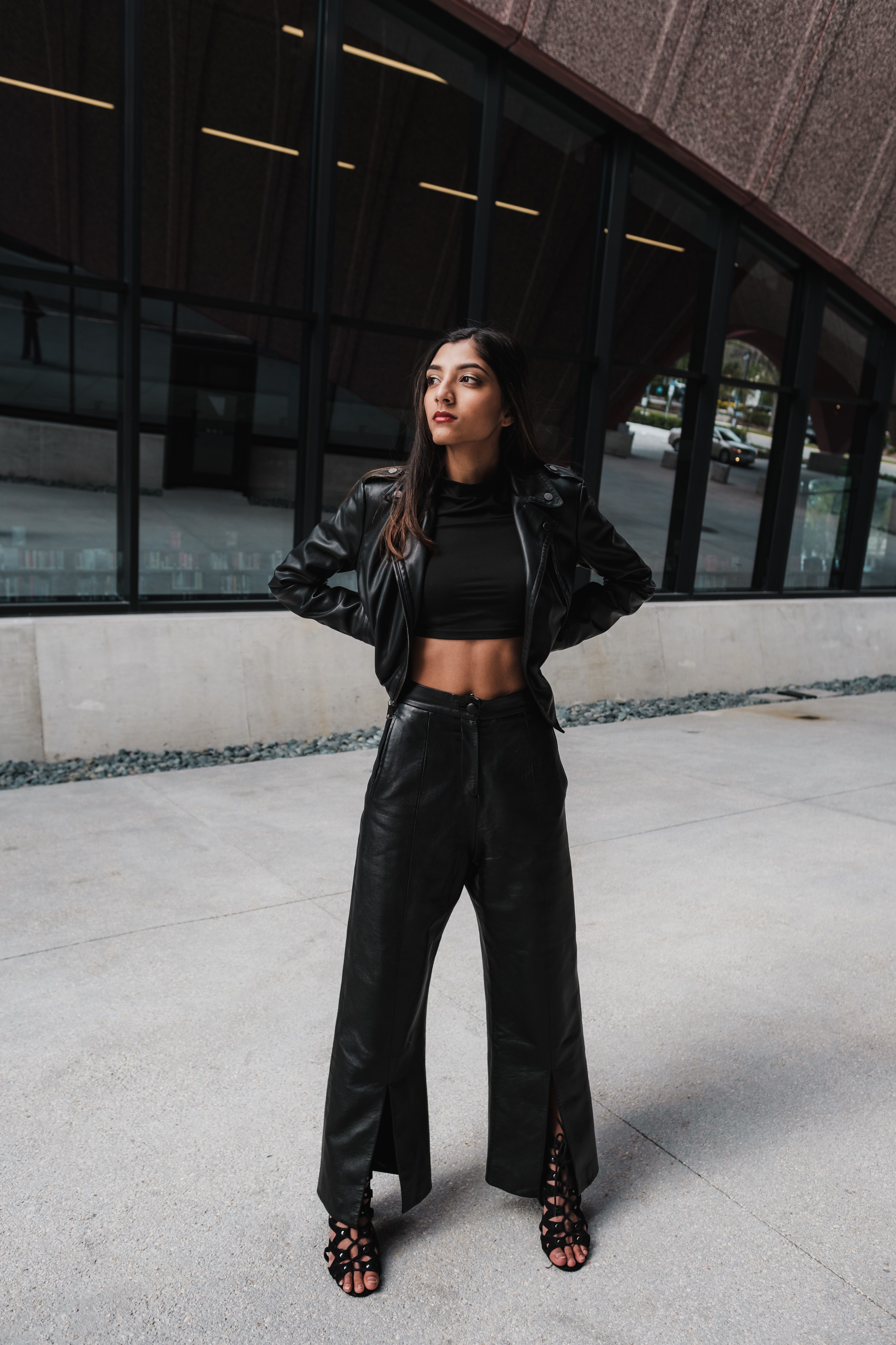 A Woman in Black Leather Jacket and Black Pants · Free Stock Photo