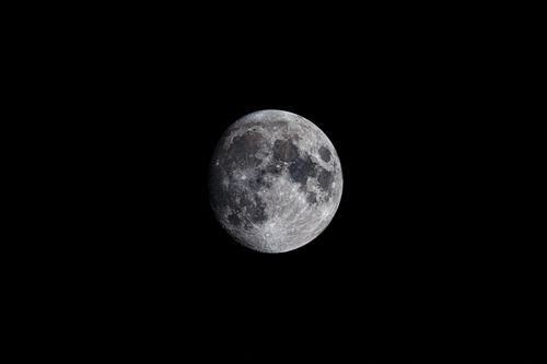 Free Close-up image of the full moon against a black background, showcasing lunar details. Stock Photo