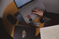 Person Using Silver Laptop Computer