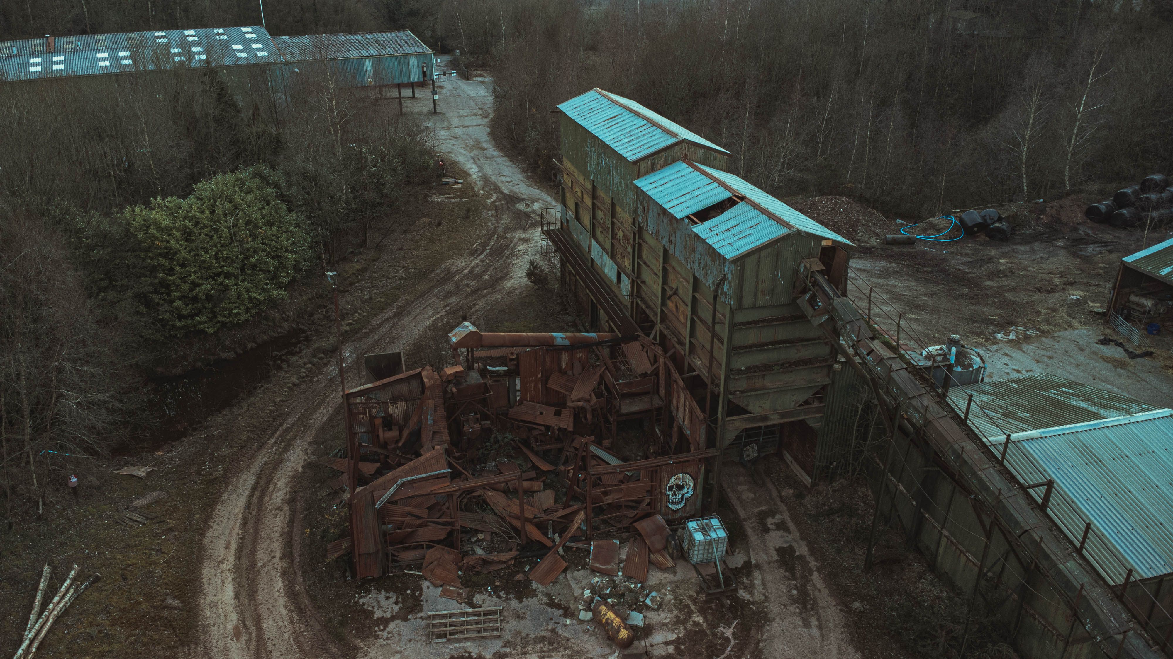 Abandoned Containers by the Fence · Free Stock Photo