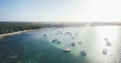 Безкоштовне стокове фото на тему «блакитна вода, Захід сонця, Острів»