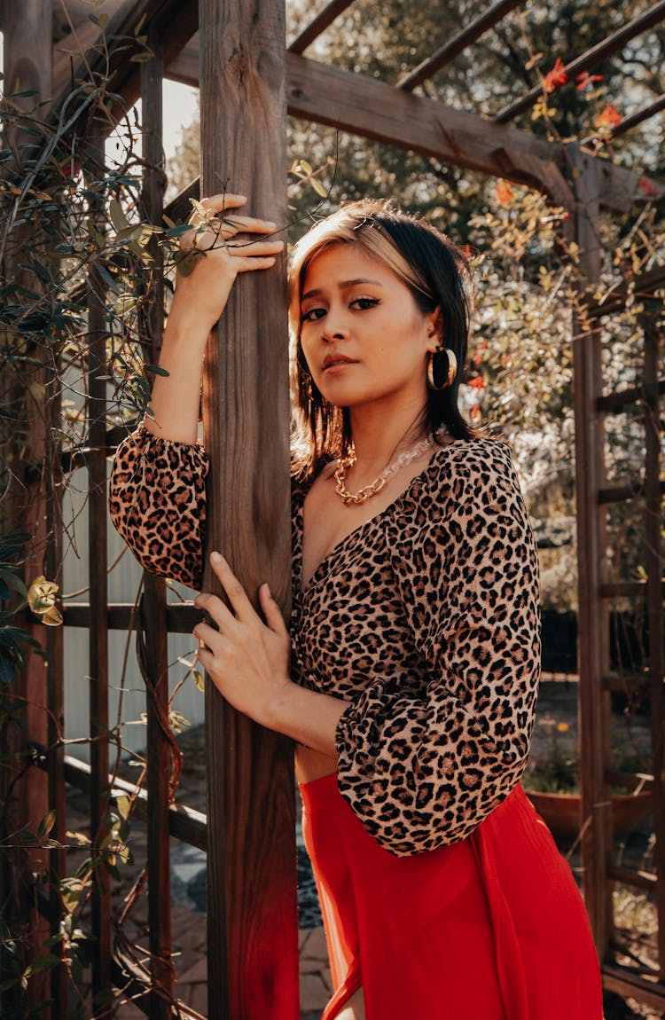 Woman Posing In Cheetah Print Shirt