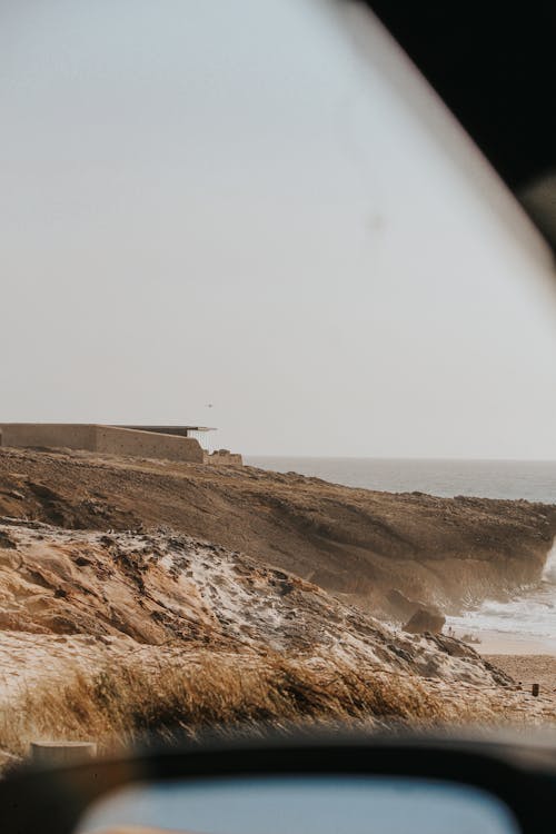 Безкоштовне стокове фото на тему «автомобіль, берег моря, вертикальні постріл»