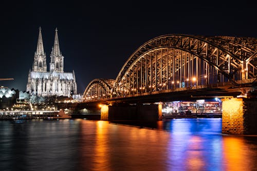 The Cologne Cathedral and Hohenzollern Bridge at Night