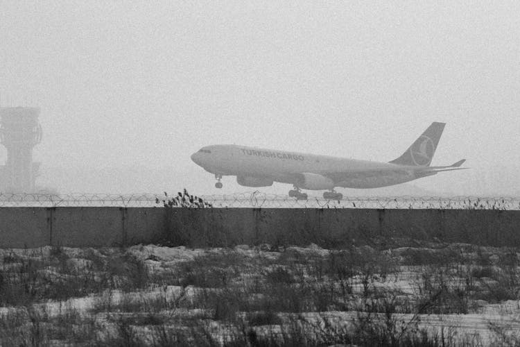 Airplane Landing On Airport 