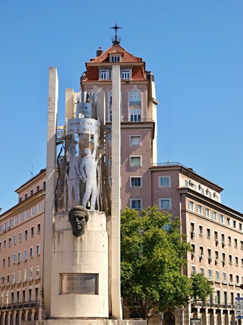 Free Historical monument and urban architecture in Lisbon, Portugal under a clear blue sky. Stock Photo