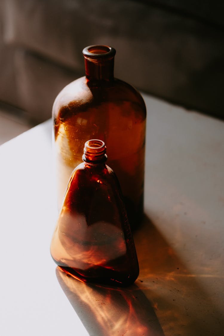 Close Up On Open Flask And Bottle