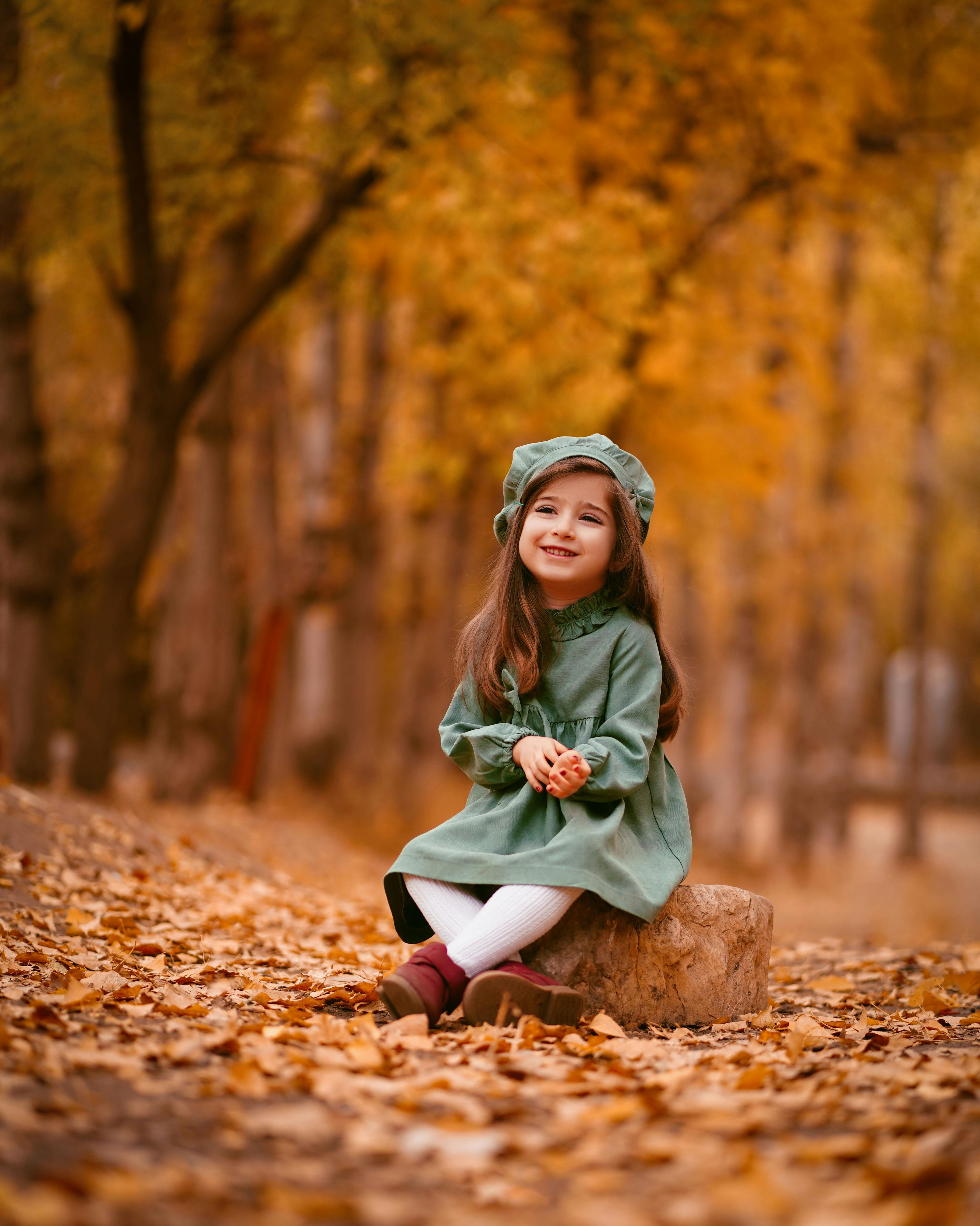 Cute little girl wearing autumn clothes Stock Photo by ©dasha11 82066844