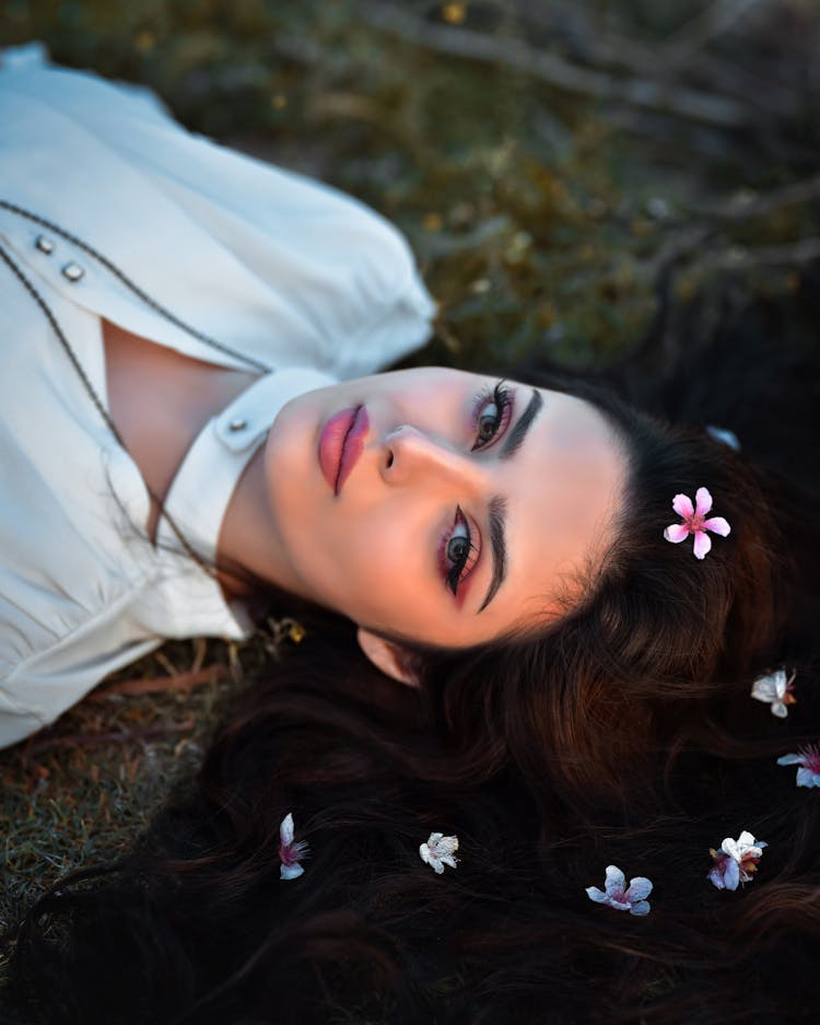 Beautiful Woman Lying On The Ground