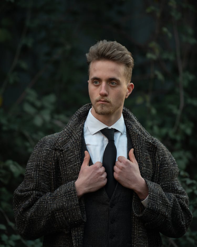 A Man Wearing A Tweed Coat