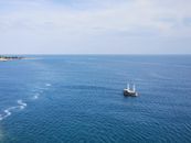 An Aerial Shot of a Ship Sailing on a Sea