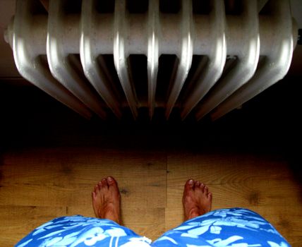First Person Point of View of a Person Standing by the Radiator 