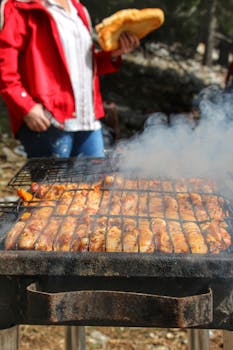 Sizzling skewers on an outdoor grill in Aladağ, Adana, Turkey.